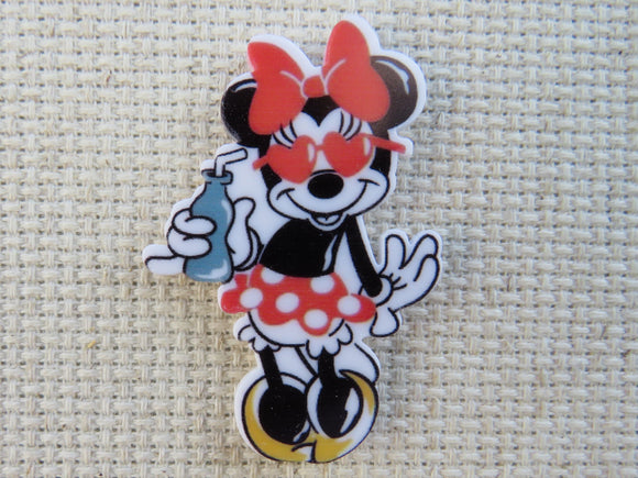 First view of Minnie Mouse with a Soda Pop Needle Minder.