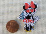 Second view of Minnie Mouse with a Soda Pop Needle Minder.