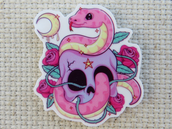 First view of Pink Snake Slithering Through a Skull Needle Minder.