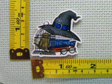 Third view of the Blue Potion Book Stack Needle Minder