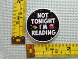 Third view of the Not Tonight I'm Reading Needle Minder
