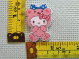 Third view of the Cute White Kitty Dressed in a Bear Costume Needle Minder