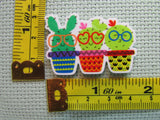 Third view of the Cute Glasses Wearing Cactus Trio Needle Minder