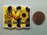 Second view of the Peace Love Sunshine Needle Minder