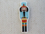 First view of Blue Drumming Nutcracker Needle Minder,.