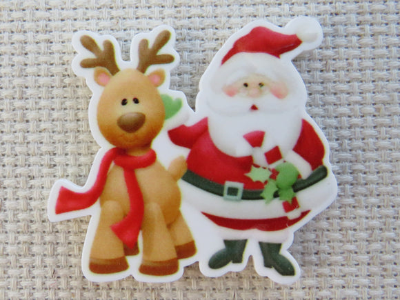 First view of Santa and a Reindeer Needle Minder,.