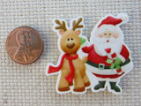 Second view of Santa and a Reindeer Needle Minder,.