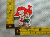 Third view of the Pebbles and Bam Bam Needle Minder