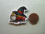 Second view of the Red Potion Books Needle Minder