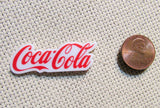 Second view of the Coca Cola Needle Minder