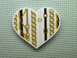 First view of the Unchained Heart Needle Minder