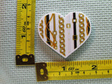 Third view of the Unchained Heart Needle Minder