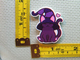 Third view of the Purple Cat with a Witches Hat Needle Minder