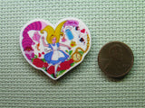 Second view of the Alice in Wonderland Heart Needle Minder
