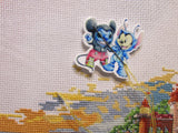 Third view of the Mickey Dressed as Stitch and Vice Versa Needle Minder