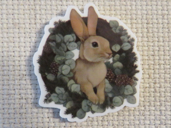 First view of Bunny in a Green Wreath Needle Minder.