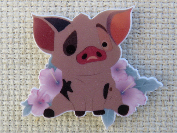 First view of Pua Sitting in Flowers Needle Minder.