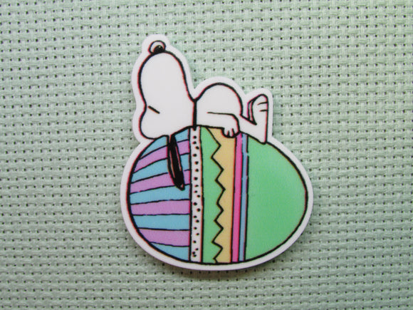 First view of the Snoopy Sleeping on an Easter Egg Needle Minder