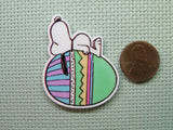 Second view of the Snoopy Sleeping on an Easter Egg Needle Minder