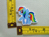 Third view of the Rainbow Colored Pony Needle Minder