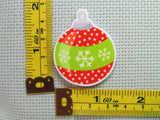 Third view of the Red and Green Snowflake Polka Dot Christmas Ornament Needle Minder