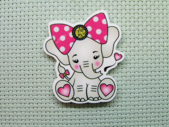 First view of the Cute Elephant Wearing a Pink and White Polka Dot Bow Needle Minder
