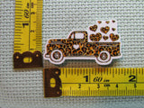 Third view of the Animal Print Truck Full of Hearts Needle Minder