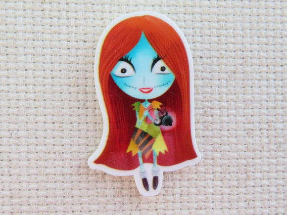 First view of Sally with a Black Rose Needle Minder.
