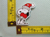 Third view of the Heart Hugging Snoopy with a Red Cap Needle Minder