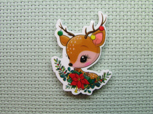 First view of the Cute Reindeer with a Poinsettia Swag Needle Minder