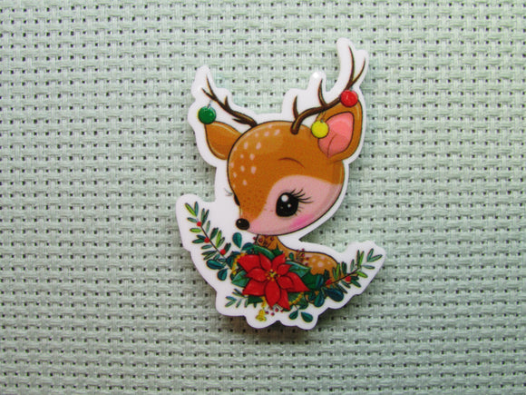 First view of the Cute Reindeer with a Poinsettia Swag Needle Minder