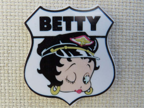 First view of Officer Betty Needle Minder.
