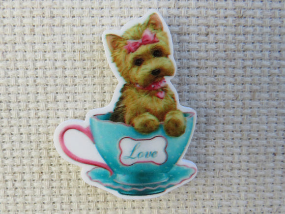 First view of Puppy Love in a Teacup Needle Minder,.