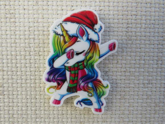 First view of dancing unicorn needle minder,.