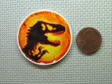 Second view of the Amber Dinosaur Needle Minder