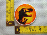 Third view of the Amber Dinosaur Needle Minder