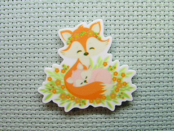First view of the Momma Fox with her Pup Needle Minder