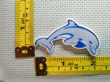 Third view of the Adorable Dolphin Needle Minder