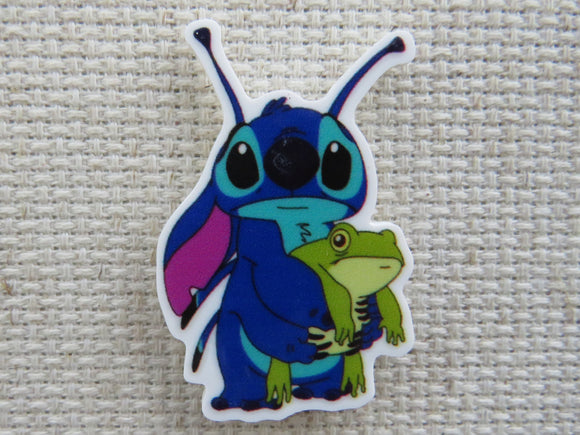 First view of Stitch Holding a Frog Needle Minder.