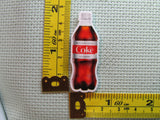 Third view of the Coke Bottle Needle Minder