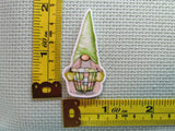 Third view of the Green Gnome with A Basket Full of Easter Eggs Needle Minder