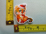 Third view of the Playful Christmas Tiger Needle Minder