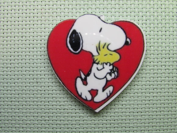 First view of the Snoopy and Woodstock in a Large Red Heart Needle Minder