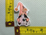 Third view of the Easter Gnome Holding a Bunny and an Egg Needle Minder