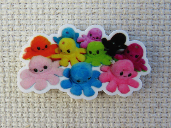 First view of A Pile of Plush Octopus Needle Minder.