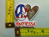 Third view of the Peace Love America Needle Minder