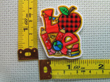 Third view of the The Love of Teaching Needle Minder