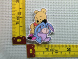 Third view of the Pooh and Eeyore Needle Minder