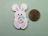 Second view of the Easter Bunny Holding a Pretty Flower Easter Egg Needle Minder