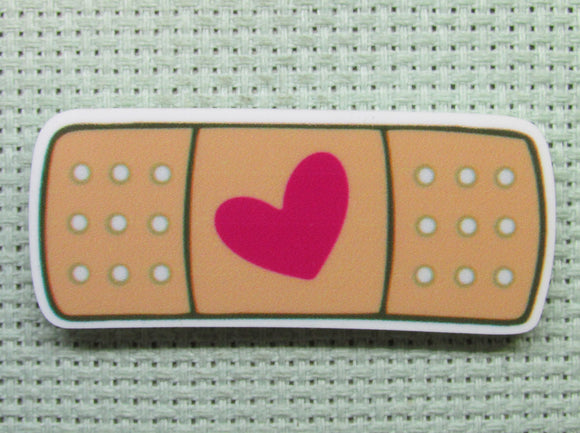 First view of the All Better With Love Band aid Needle Minder